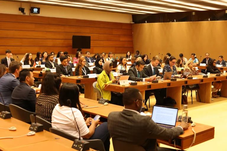 A Transformative Journey : Global Youth Summit for Change 2025 Conference attendees in a meeting room