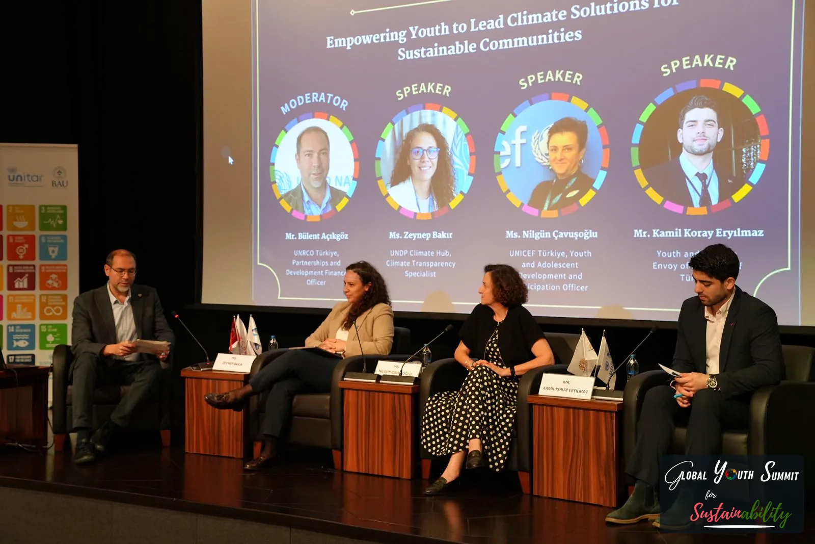 Panel I on stage: moderator and three speakers