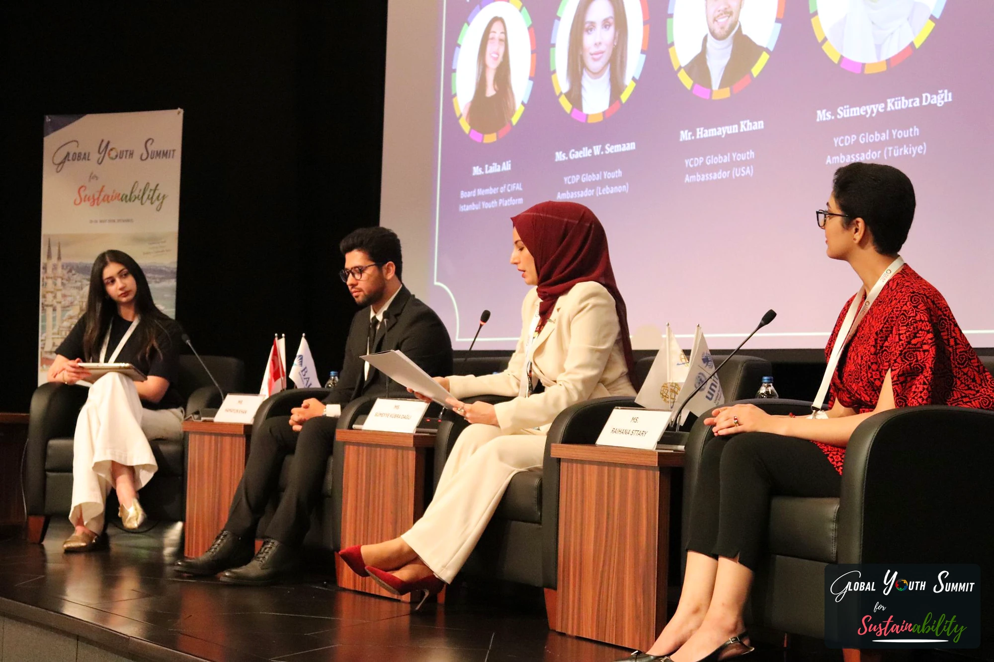 Panel II: speakers discussing youth-led innovation on stage