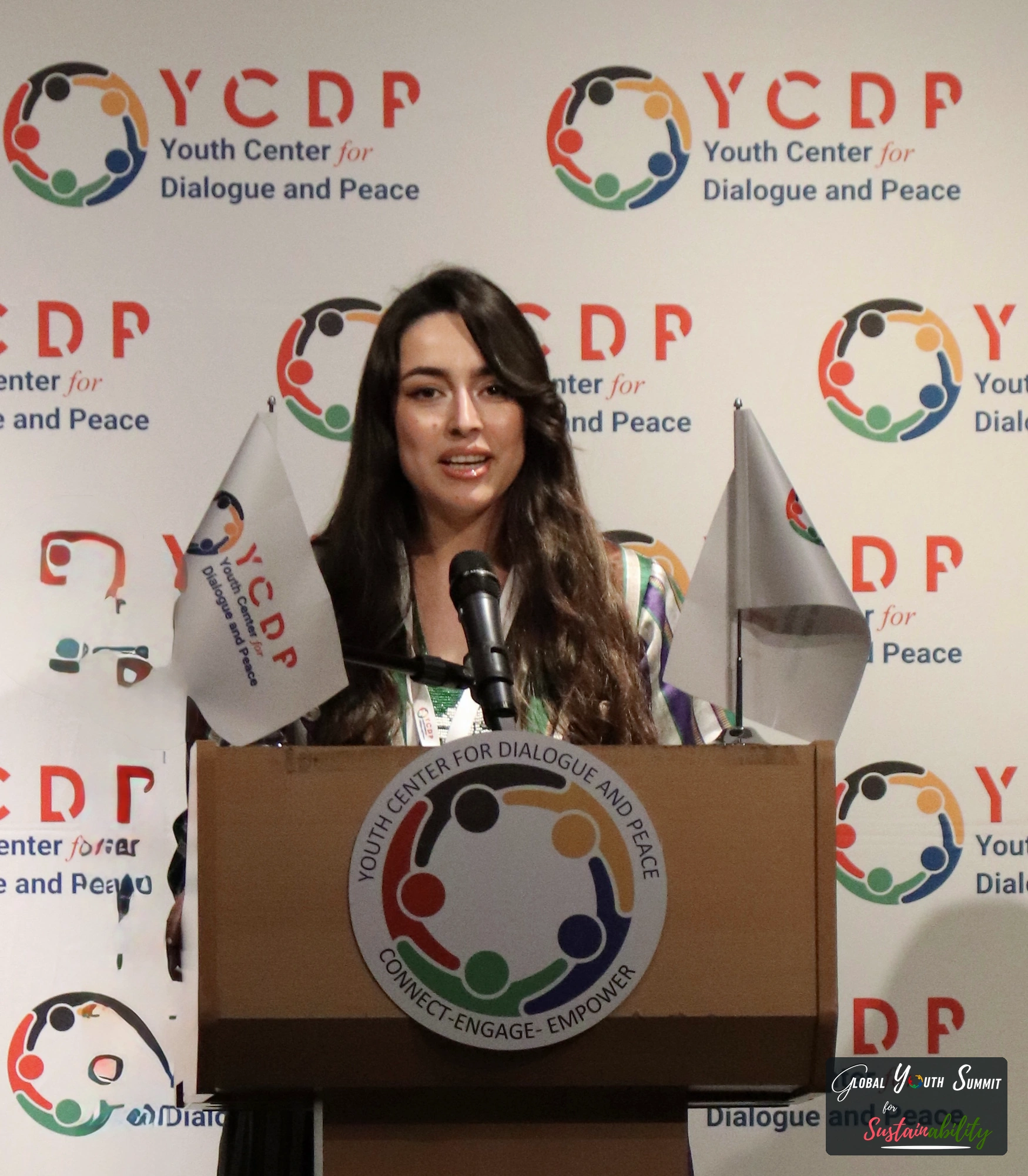 A young delegate pitching at the YCDP podium