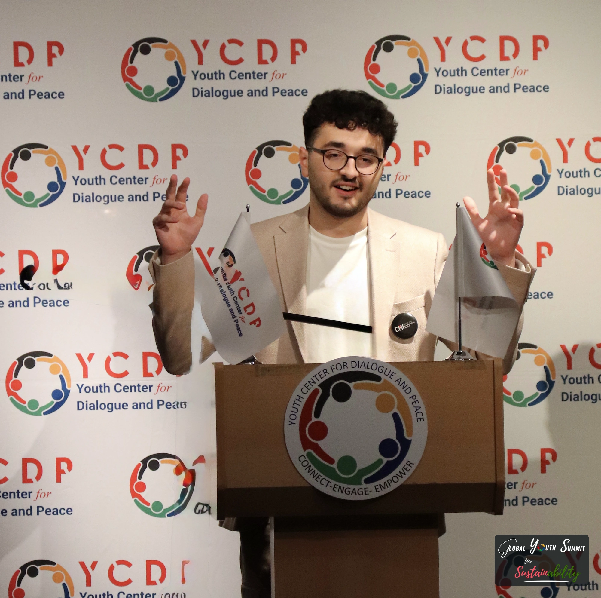 Delegate presenting a youth solution at the podium